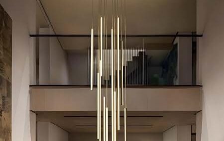 Modern loft with a tall cluster of slim pendant lights